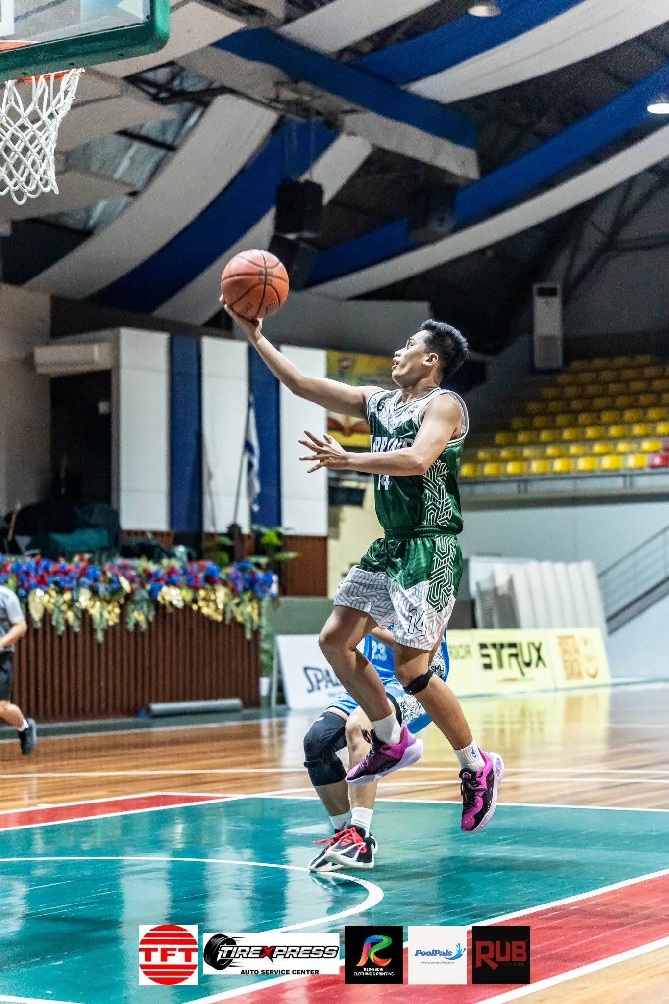 Player driving to the basket for a layup